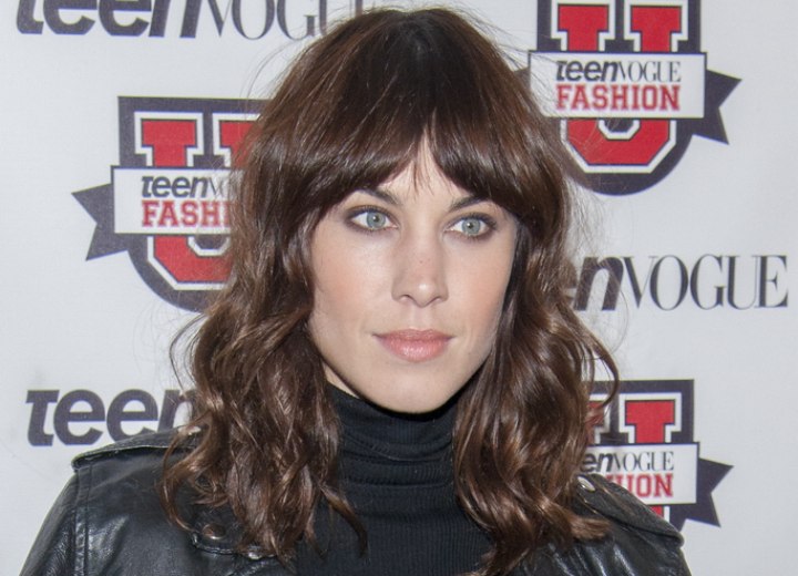 Alexa Chung with long hair and loose curls