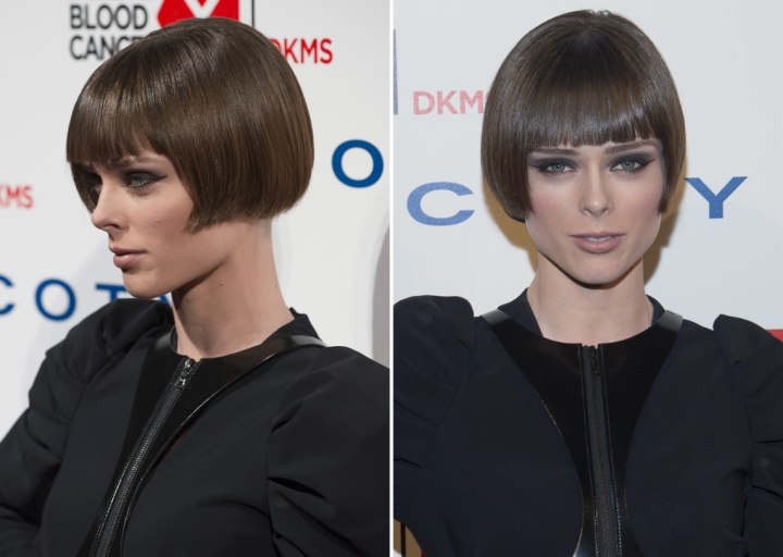 Coco Rocha with short hair that angles straight back