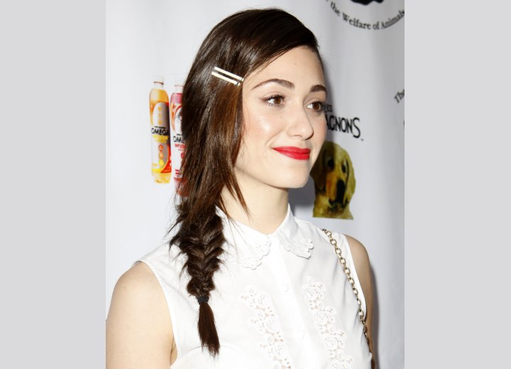 Emmy Rossum with her hair in a low braid