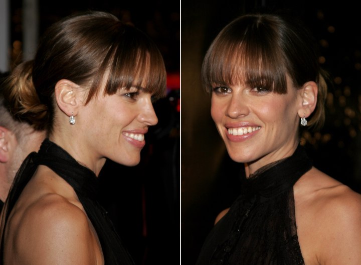 Side view of Hilary Swank's hair with a bun