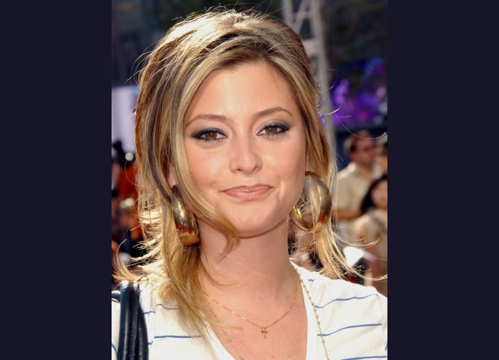 Holly Valance wearing her hair up with loose strands