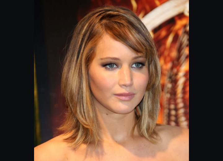 Jennifer Lawrence - Hair colored with a root boost