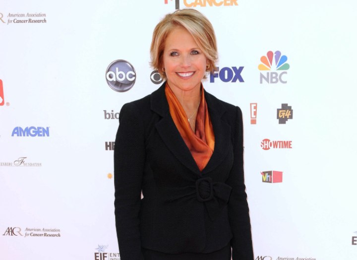 Katie Couric wearing a power suit