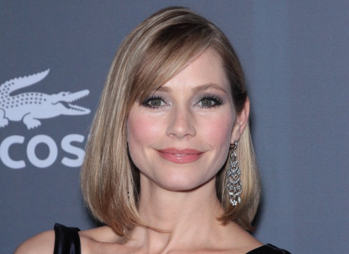 Meredith Monroe's mid-length hairstyle with rounded tips