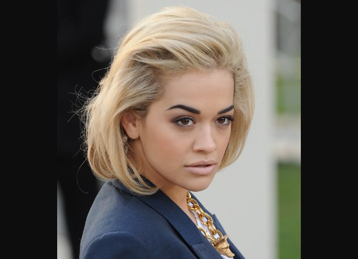 Rita Ora with her hair styled away from her face