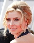 Sarah Chalke with her hair brushed up