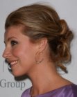 Sarah Chalke's up-style with volume at the crown