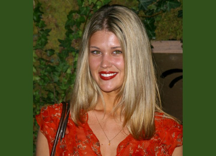 Sarah Lancaster with long sun kissed blonde hair