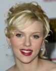 Scarlett Johansson sporting a soft and romantic curly up do
