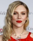 Scarlett Johansson sporting retro hair with finger waves and spiral curls
