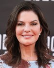 Sela Ward aged over 60 and wearing her hair long 