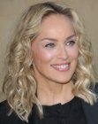 Sharon Stone's shoulder length hair with a middle part and soft texture