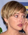 Sharon Stone's short hairstyle with a tapered nape section