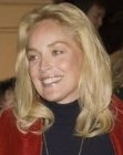 Sharon Stone wearing her hair long and curly
