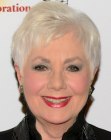 Shirley Jones wearing a short finger-styled pixie hairstyle