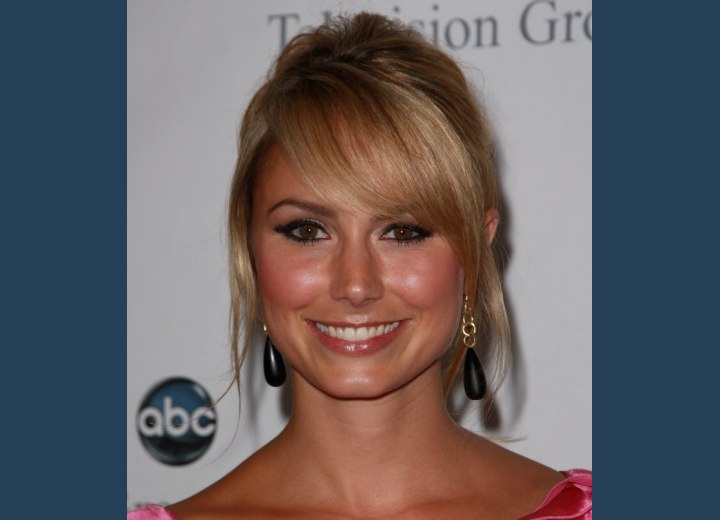Stacy Keibler wearing her hair in a chignon