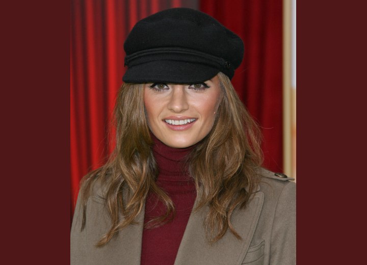 Stana Katic Hairstyle on Stana Katic With Long Hair And Wearing A Chauffeur Style Hat And