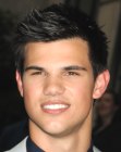 Taylor Lautner with short dark hair