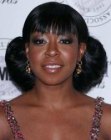 Tichina Arnold with her hair up