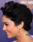 Vanessa Hudgens with her naturally curly hair cut short