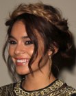 Vanessa Hudgens wearing her hair up with a Bohemian vibe