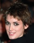 Winona Ryder wearing her hair short in a pixie