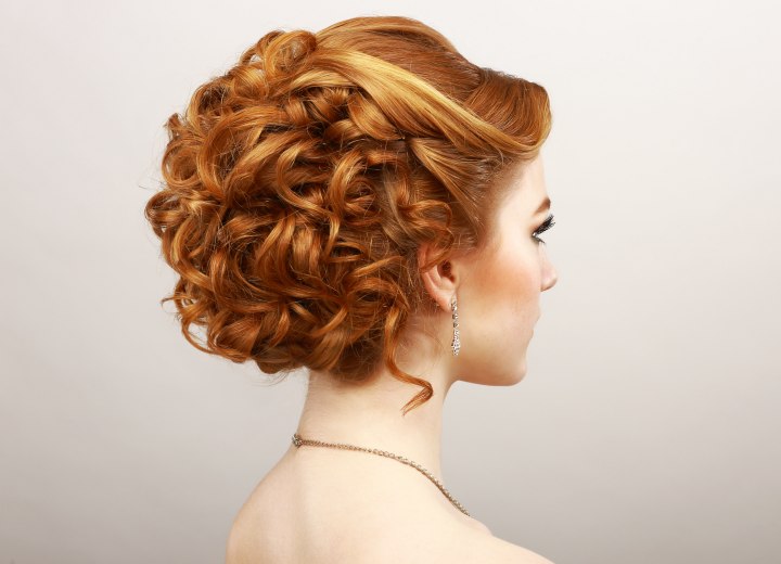 Hair in an up style with curls