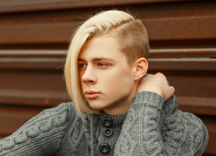 Crossover haircut with a shaved undercut