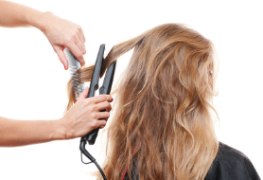 hair straightening with a flat iron