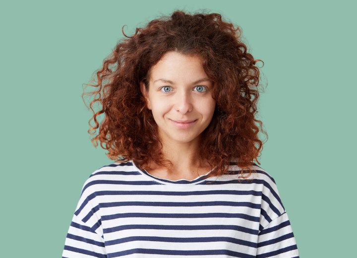 Happy woman with curly hair