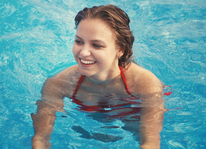Woman in a pool with chlorine