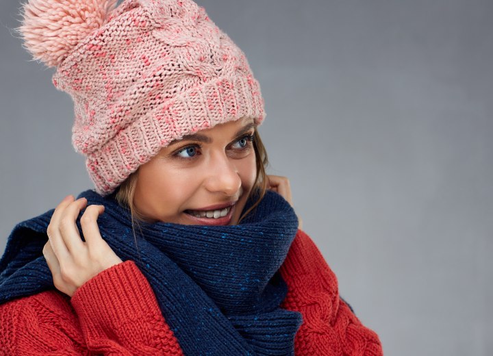 Girl wearing a hat in winter