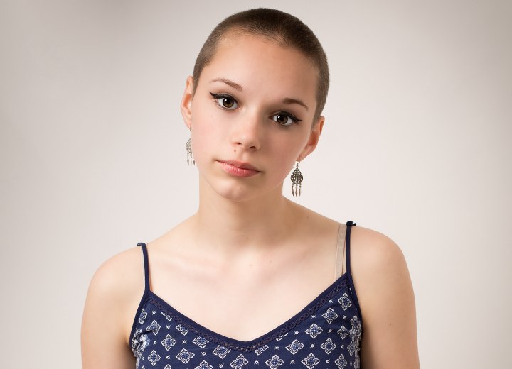 Girl with buzzcut short hair after a donation shave