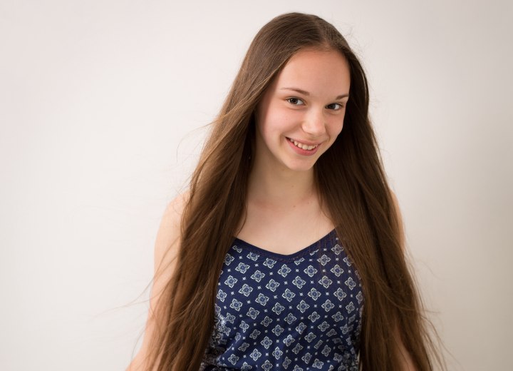 Girl with long hair before a donation headshave