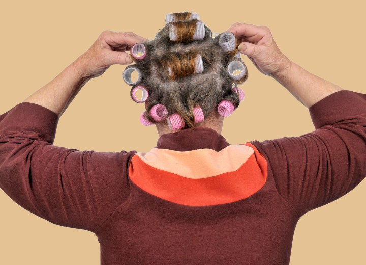 Old woman with rollers in her hair