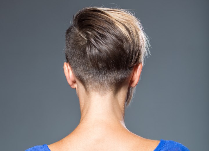 Rear view of a very short haircut for women