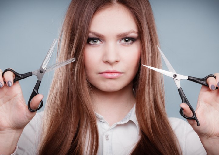 Woman holding scissors