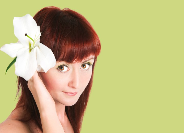 Girl wearing a lily flower in her hair