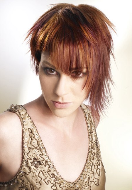 Asymmetrical hairstyle with contrasting colors in copper and gold