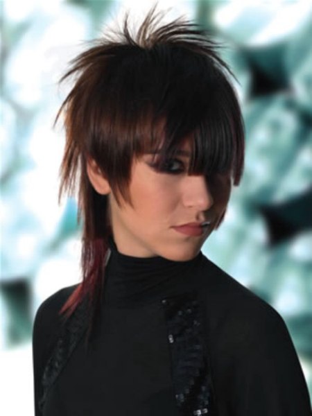 Hairstyle with different lengths and choppy spiky fringes