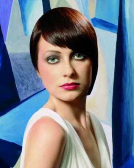Simple short haircut, contoured with a softly curving angled fringe