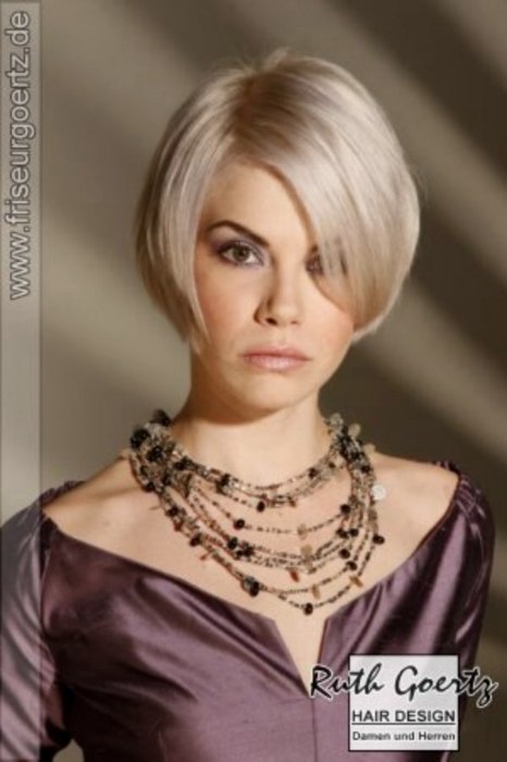 Short hairstyle with a clipped nape to expose a beautiful long neck