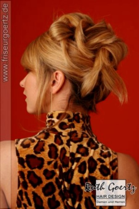 Back view of an updo with a weaving of curls