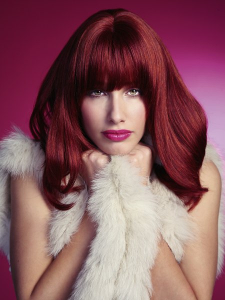 Deep ruby red hair color on a simple straight hairstyle