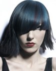 Black blunt cut hair with blue color accents