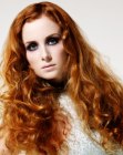 Long coppery red hair with mussed curls
