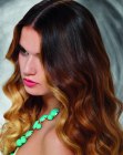 Long hair with soft waves and blended colors