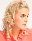 Hairstyle with spiraled curls and high lift