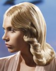 Long 1940s hairstyle with the ends curled upwards