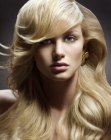 Long blonde hair with cascading waves